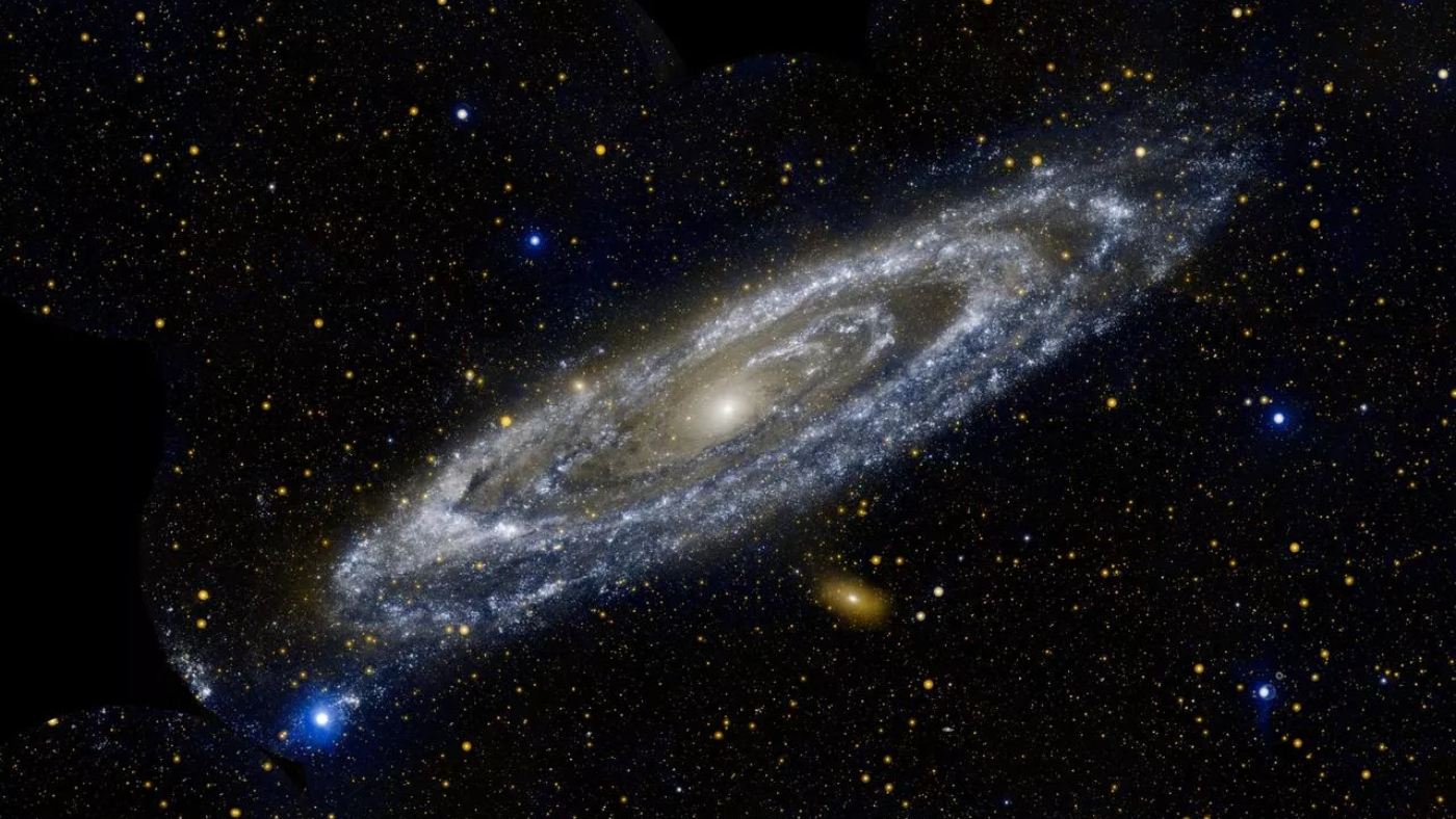 Qual a distância da galáxia mais perto da Via Láctea?