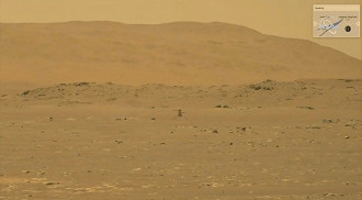 Foto capturada pelo rover Perseverance em que mostra o Ingenuity pairando sobre o solo. (Imagem: Reprodução / Nasa/JPL-Caltech/ASU /Handout via Reuters)