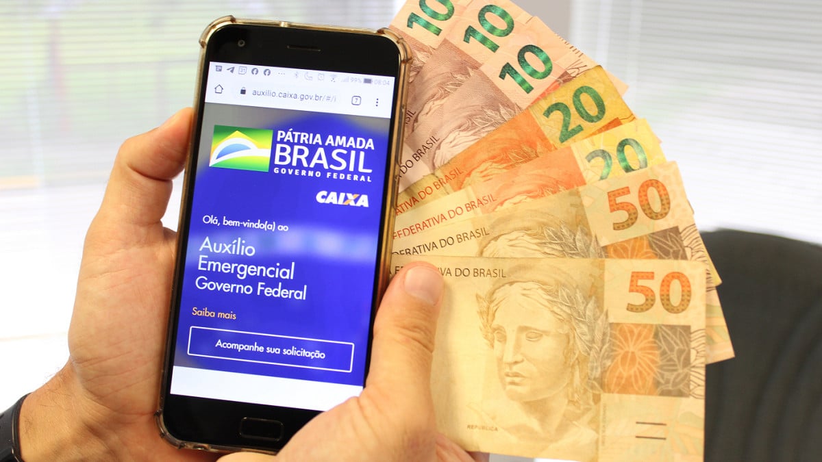 Entenda quem precisa devolver o Auxílio Emergencial. Imagem: Oficina da Net